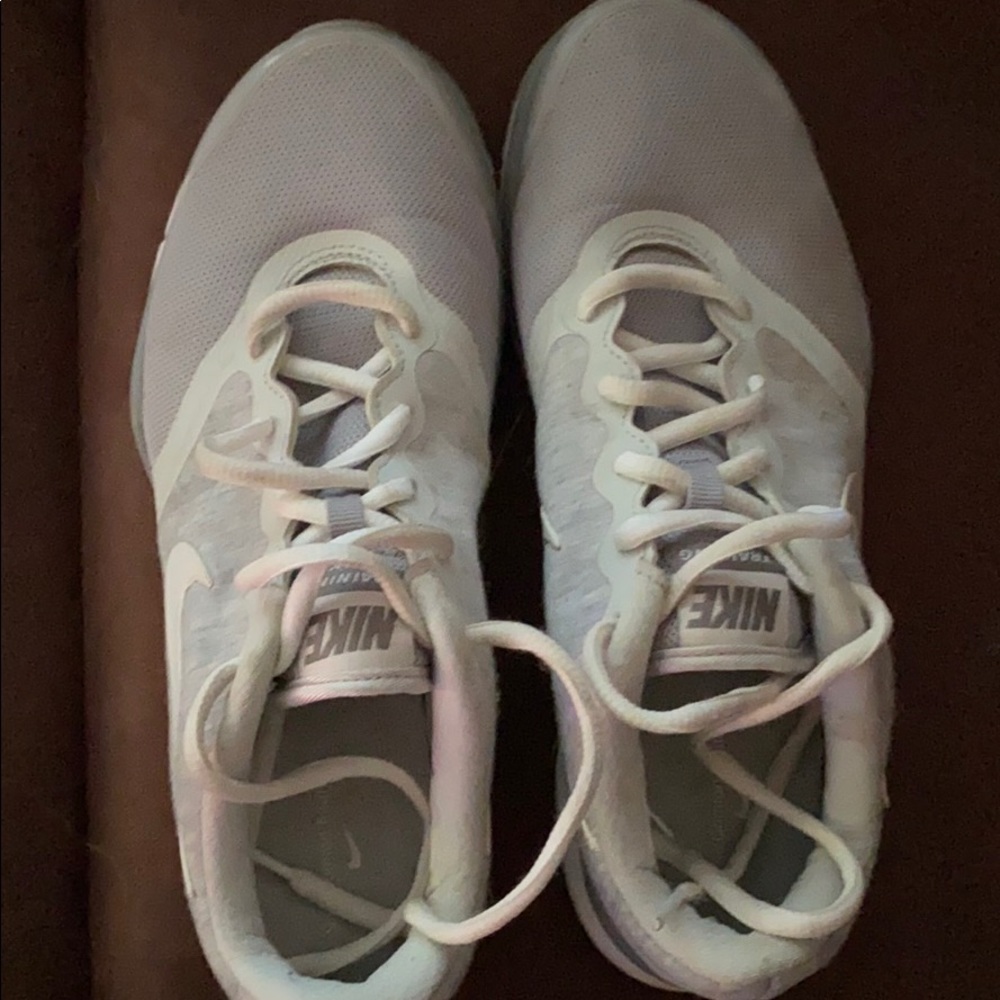 Gray and white nike sneakers